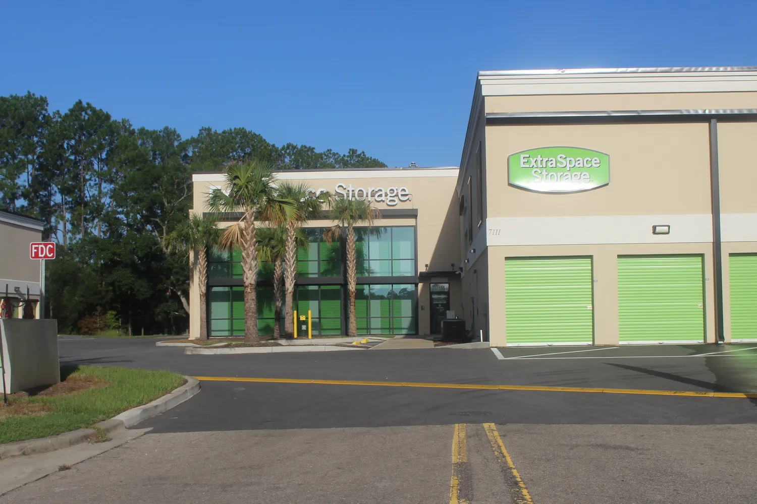 Climate-controlled self storage building with drive-up unit doors
