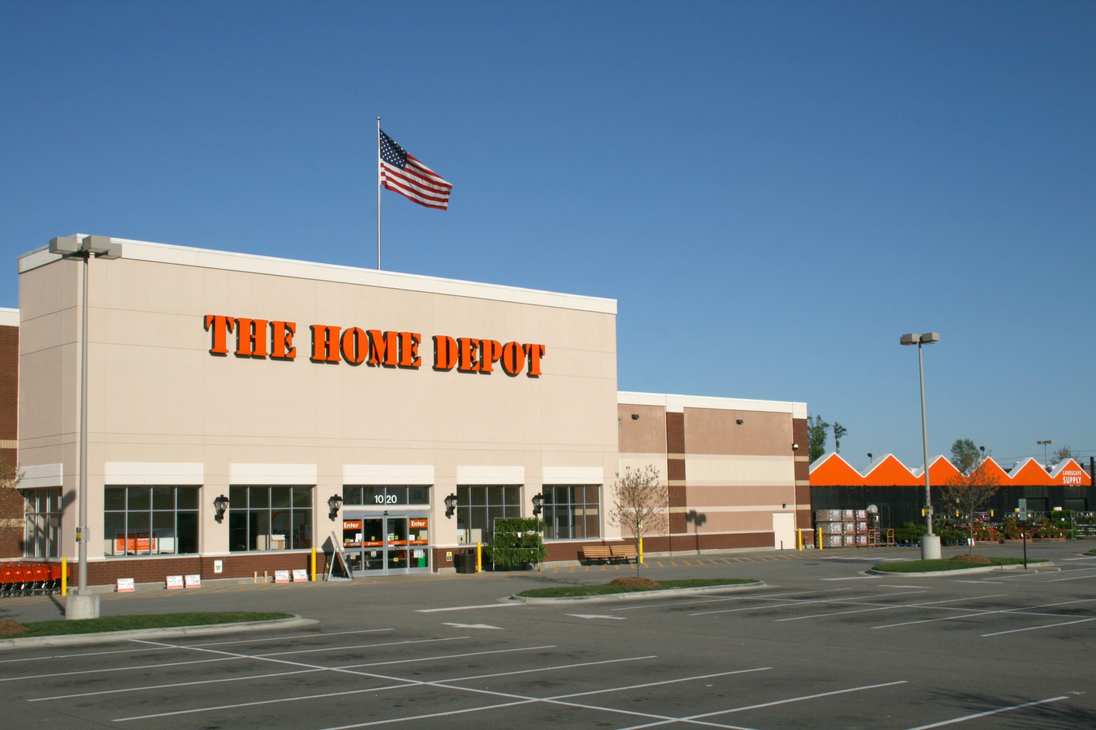 Grocery-anchored shopping center with a full parking lot