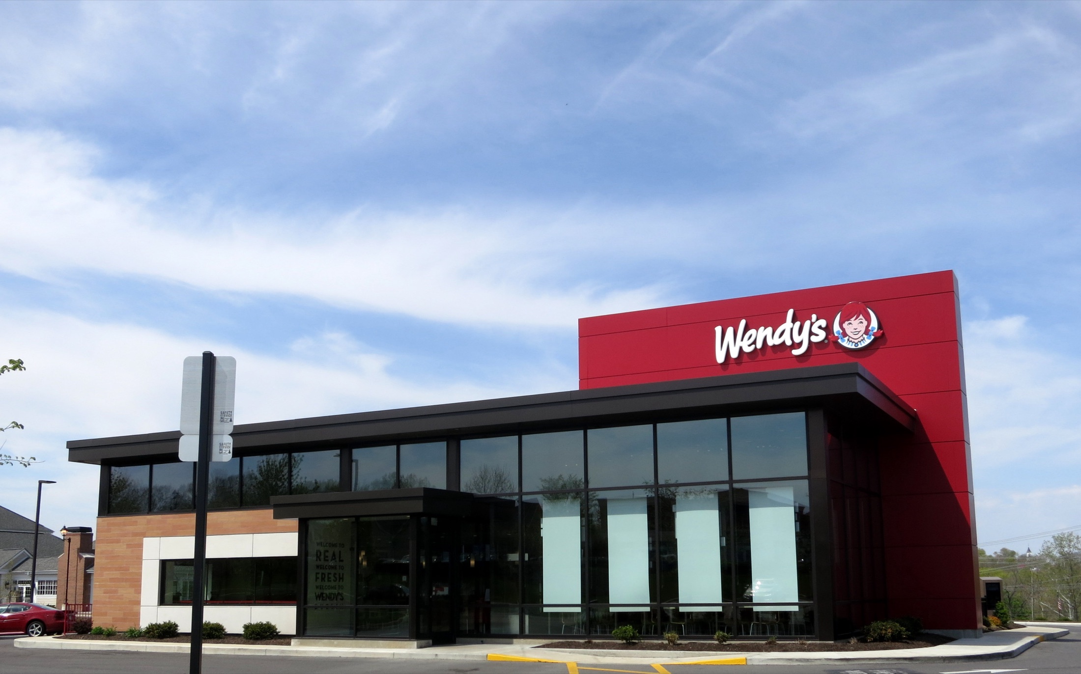 Drive-thru fast food restaurant building with a double drive-thru lane